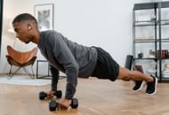 Dumbbell push-ups. (Image credit: Pexels/ Mart Production)